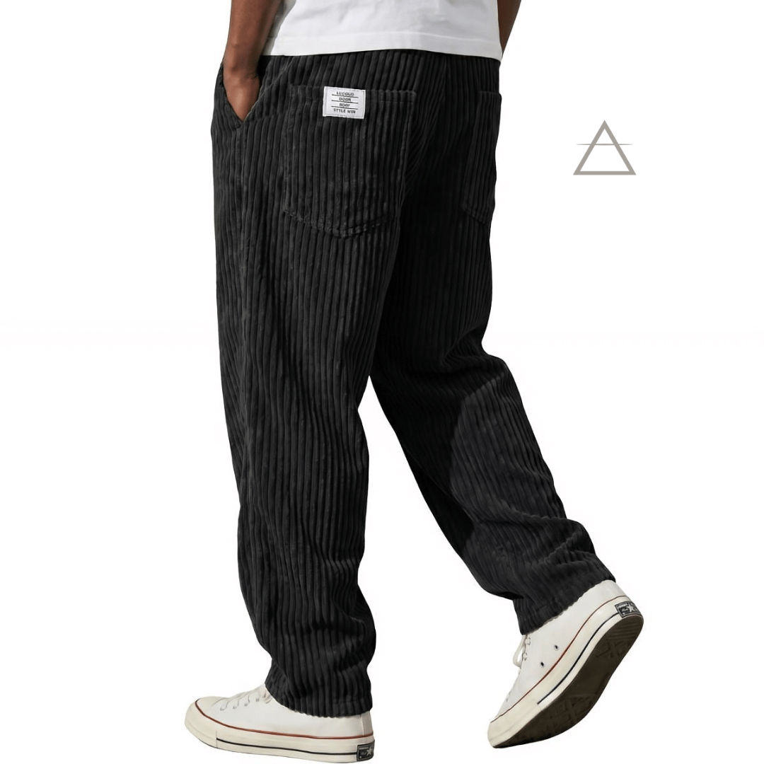 Pantalon Jules pour homme en velours côtelé noir, à coupe ample et taille élastiquée avec cordon de serrage.⠋