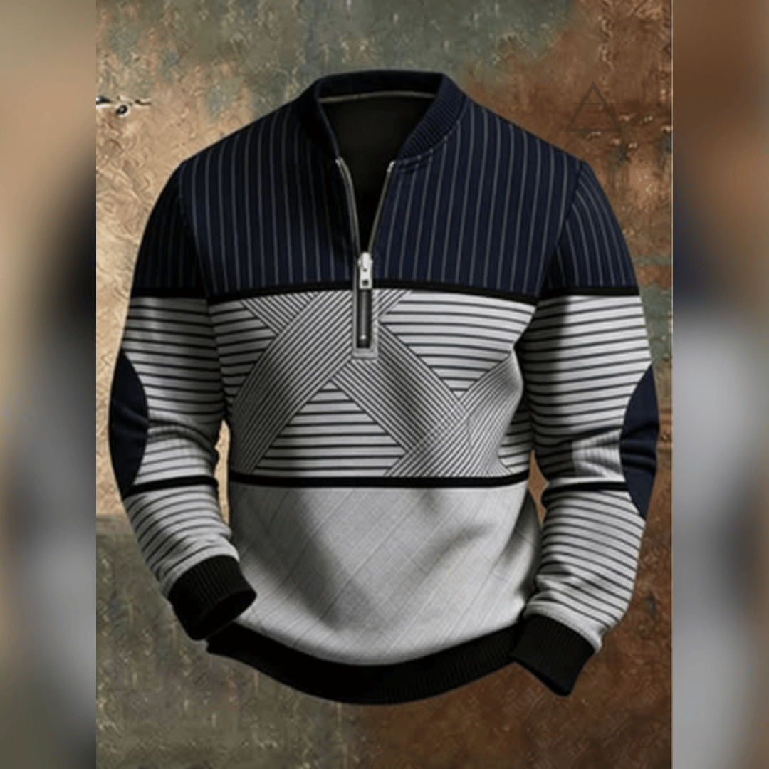 Haut Victor bleu marine vu de face, avec motif géométrique gris clair et col à demi-zip